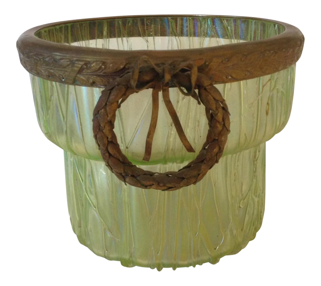 Loetz Iridescent Tree Bark Vase With Metal Wreath Collar: This exceptional piece is fashioned of opalescent light green glass that has been worked with slip from the bottom to the top surrounding the piece from roots to tree trunks. It looks like a forest