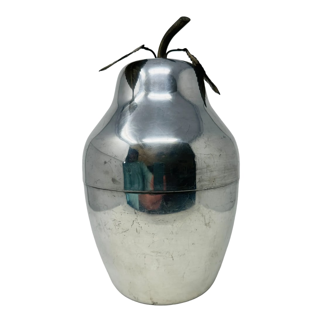 Vintage Italian Stainless Steel Pear Shaped Ice Bucket With Leaf Handle Made in Italy: Elevate your barware collection with this stunning Vintage Stainless Steel Pear Shaped Ice Bucket with Leaf Handle. Made in Italy from high-quality stainless steel, this unique piece features a sleek