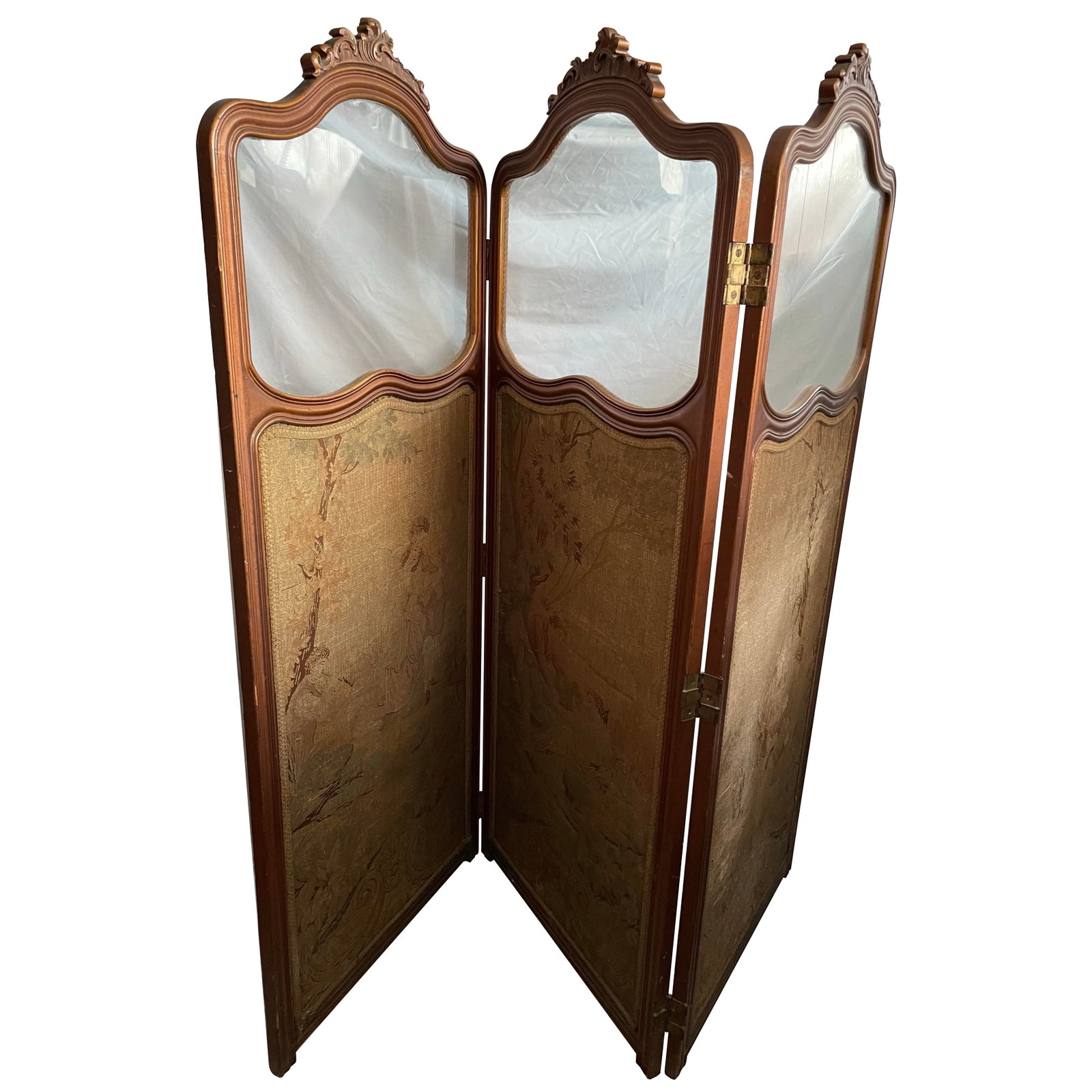 Late 19th Century French Tapestry 3 Panel Room Carved Wood Divider/Screen Glass Window: This is a lovely three panel French provincial style screen with a carved crest and a shaped glass "window" in each panel and beautiful tapestries of a courting couple in a different romantic scenes i