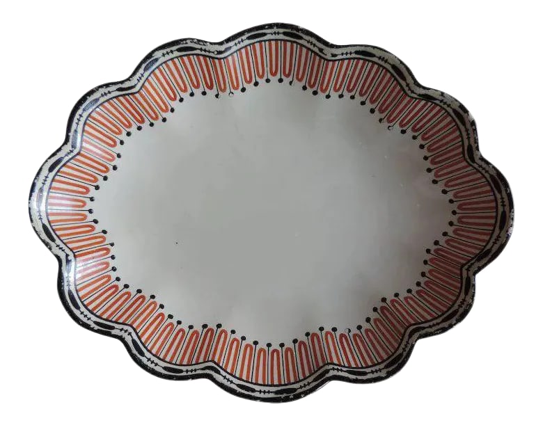 1790 English Wedgwood Creamware Etruscan Pattern Plate: Antique 18th c. Wedgwood pearlware oval dish. Enameled in red and brown neoclassical decoration with stylized gadroon and dot borders and scalloped rims. Impressed marks to the underside. Each