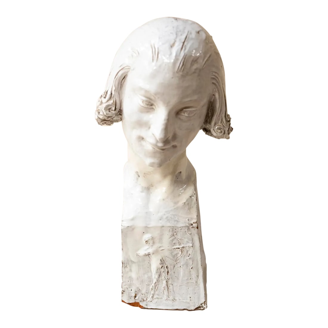 Early 20th Century Glazed Terra Cotta Bust of a Young Man by Maurice Vaury: A lovely painted and glazed terracotta bust of a young man, in this case the son of the artist, sculpted by renown French sculptor Maurice Vaury (1878 - 1965), who was commissioned by the French