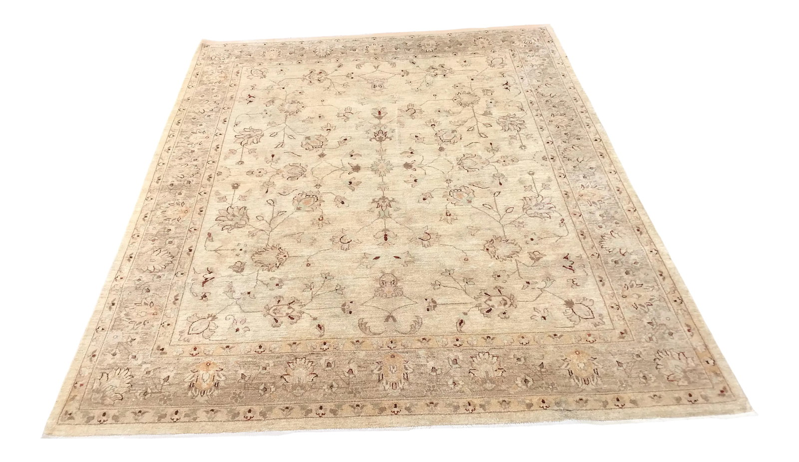 Muted Oushak Area Rug: A lovely 8 x 10 Oushak Tibetan rug bought at Bloomindale's about 10 years ago. Muted neutral color palette. Condition: Alterations: Original Condition Unaltered Imperfections: Some Imperfections Condi