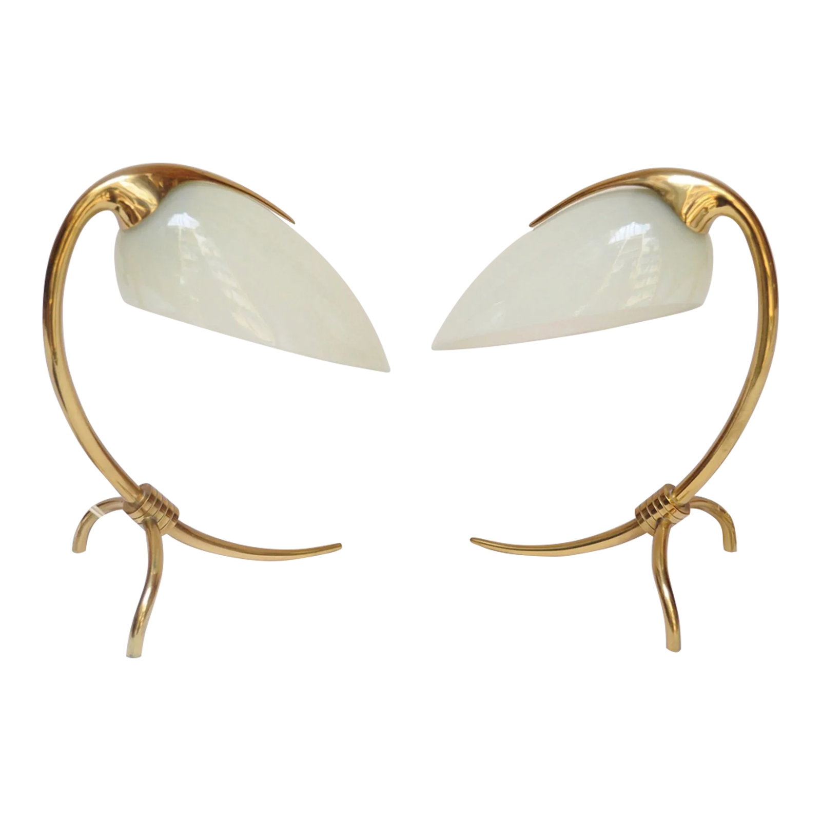 Pair of Petite Brass and Glass Tripod Bedside / Table Lamps by Oscar Torlasco: Petite bedside/table lamps designed by Oscar Torlasco for Lumen Milano (ca. 1950s, Italy). Composed of deeply sculpted brass curved frames forming a tripod base and a 'cradle' top supporting the pale