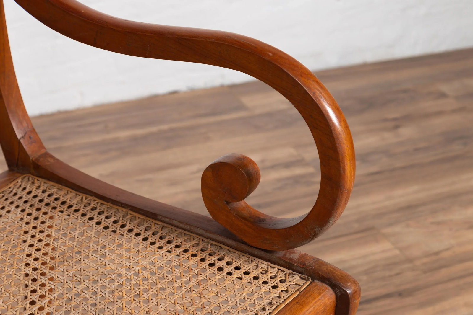 Antique Javanese Wooden Armchair with Carved Back, Curving Arms and Rattan Seat - 11