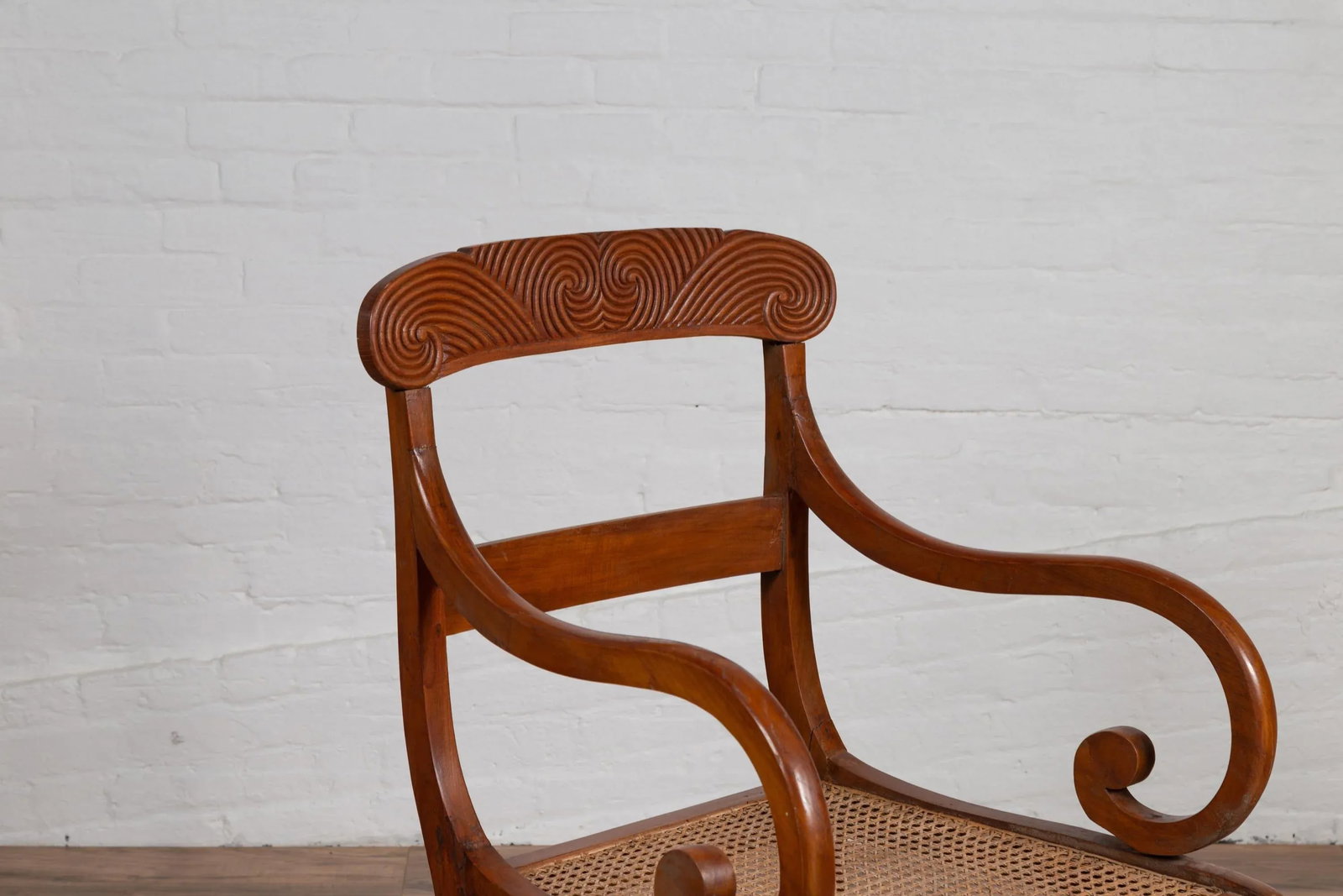 Antique Javanese Wooden Armchair with Carved Back, Curving Arms and Rattan Seat - 3