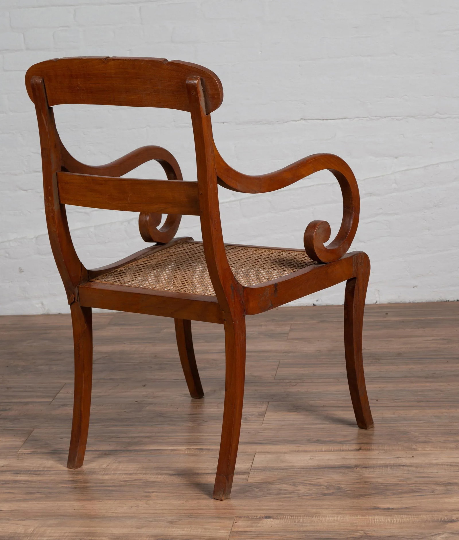 Antique Javanese Wooden Armchair with Carved Back, Curving Arms and Rattan Seat - 4