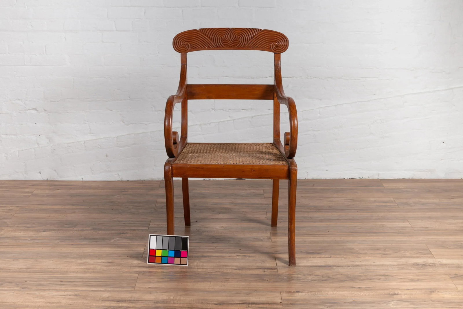 Antique Javanese Wooden Armchair with Carved Back, Curving Arms and Rattan Seat - 6