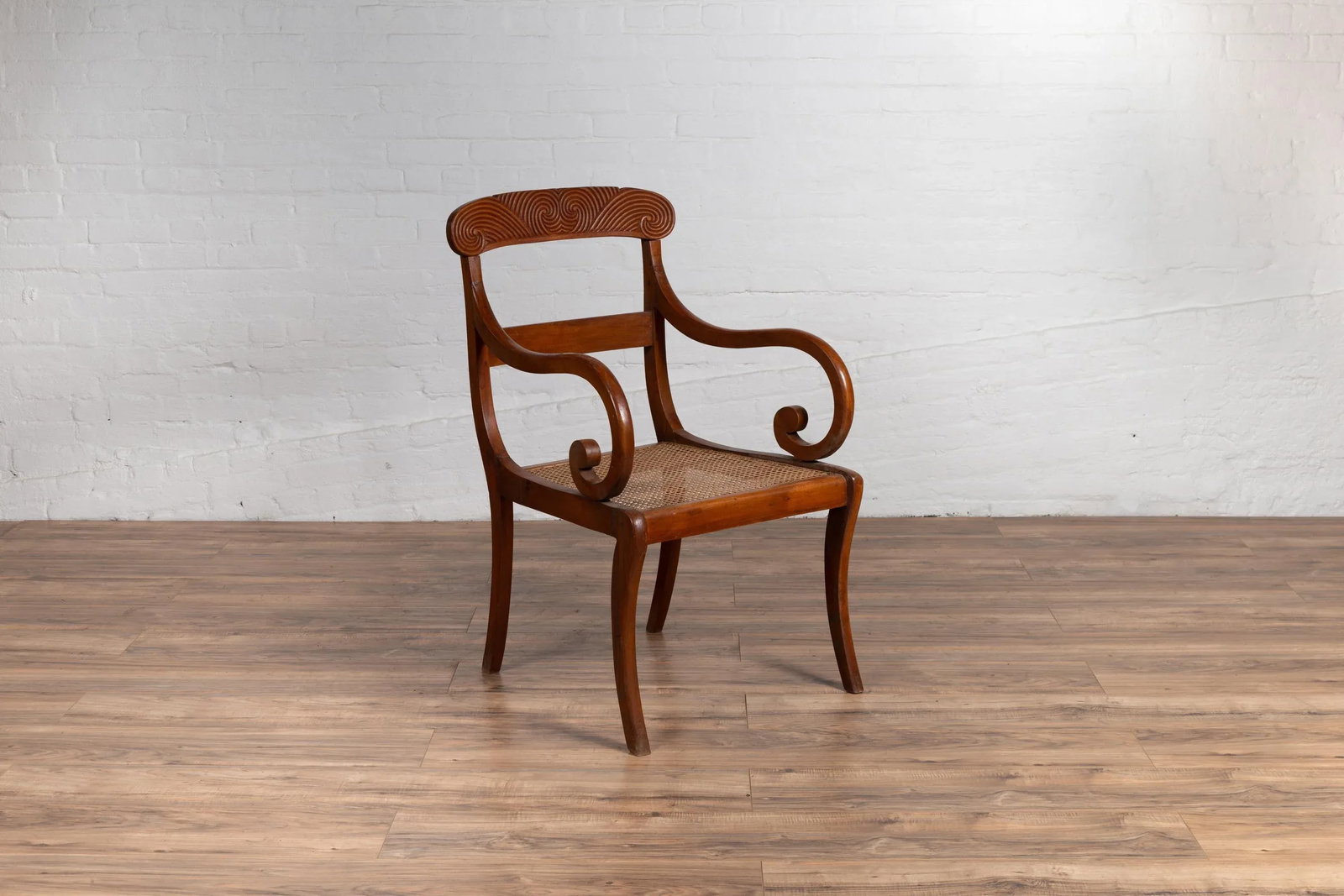 Antique Javanese Wooden Armchair with Carved Back, Curving Arms and Rattan Seat - 8