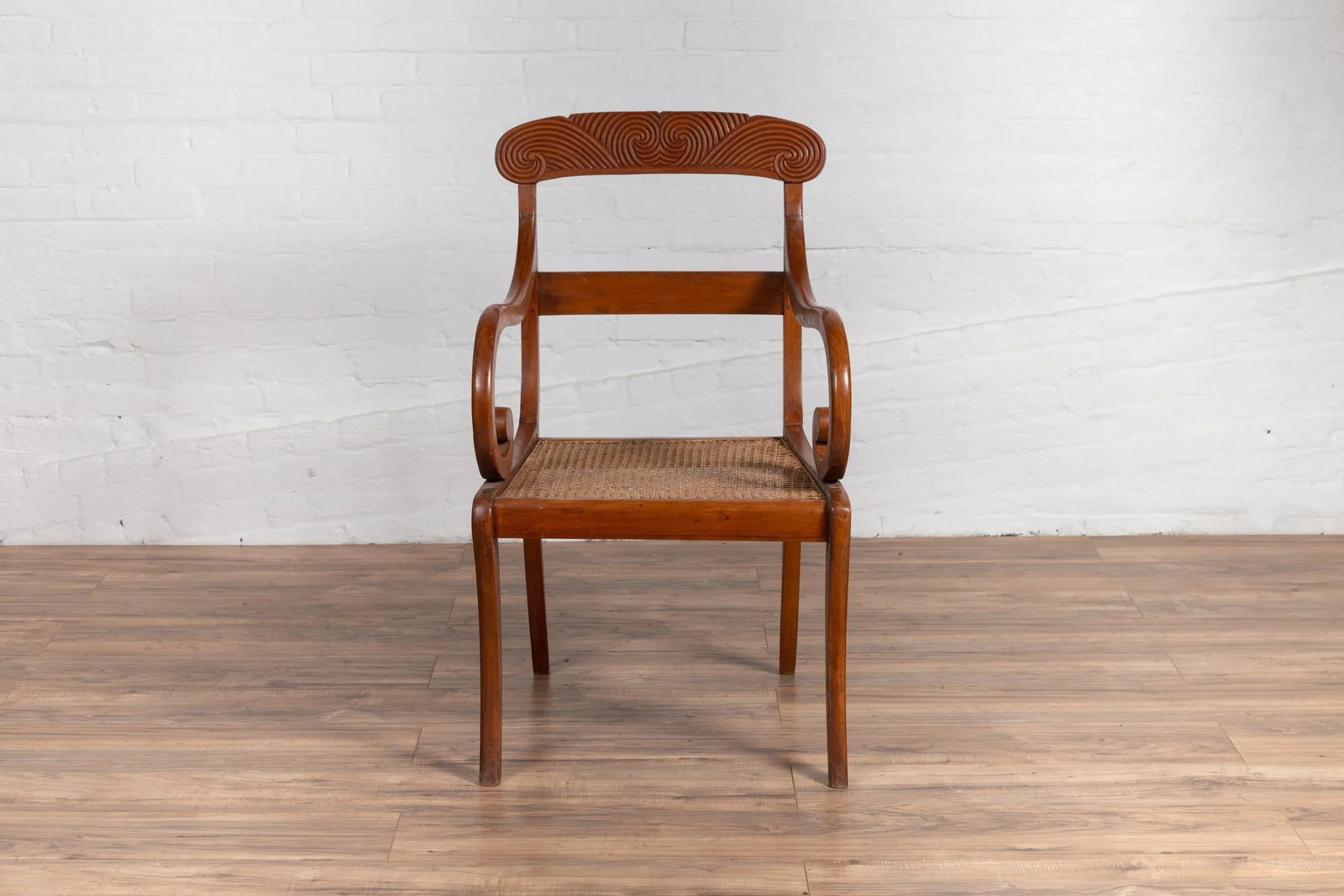 Antique Javanese Wooden Armchair with Carved Back, Curving Arms and Rattan Seat - 9