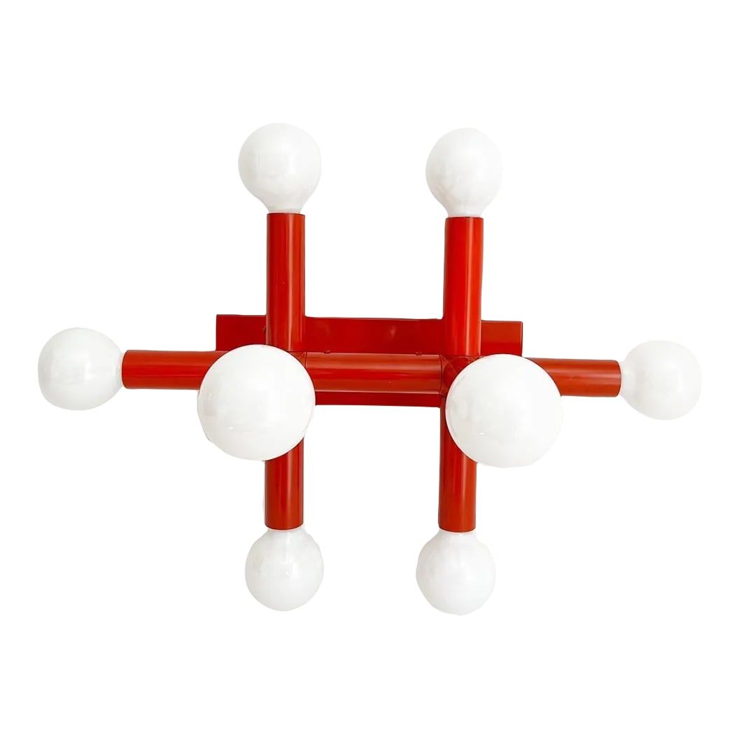 Modern Lightolier Molecule Wall Light by Dorner: Sculptural atomic modern wall or ceiling light by Lightolier of tubular metal in its original red orange enamel with eight lights and custom label. Professionally restored with new wiring and sockets