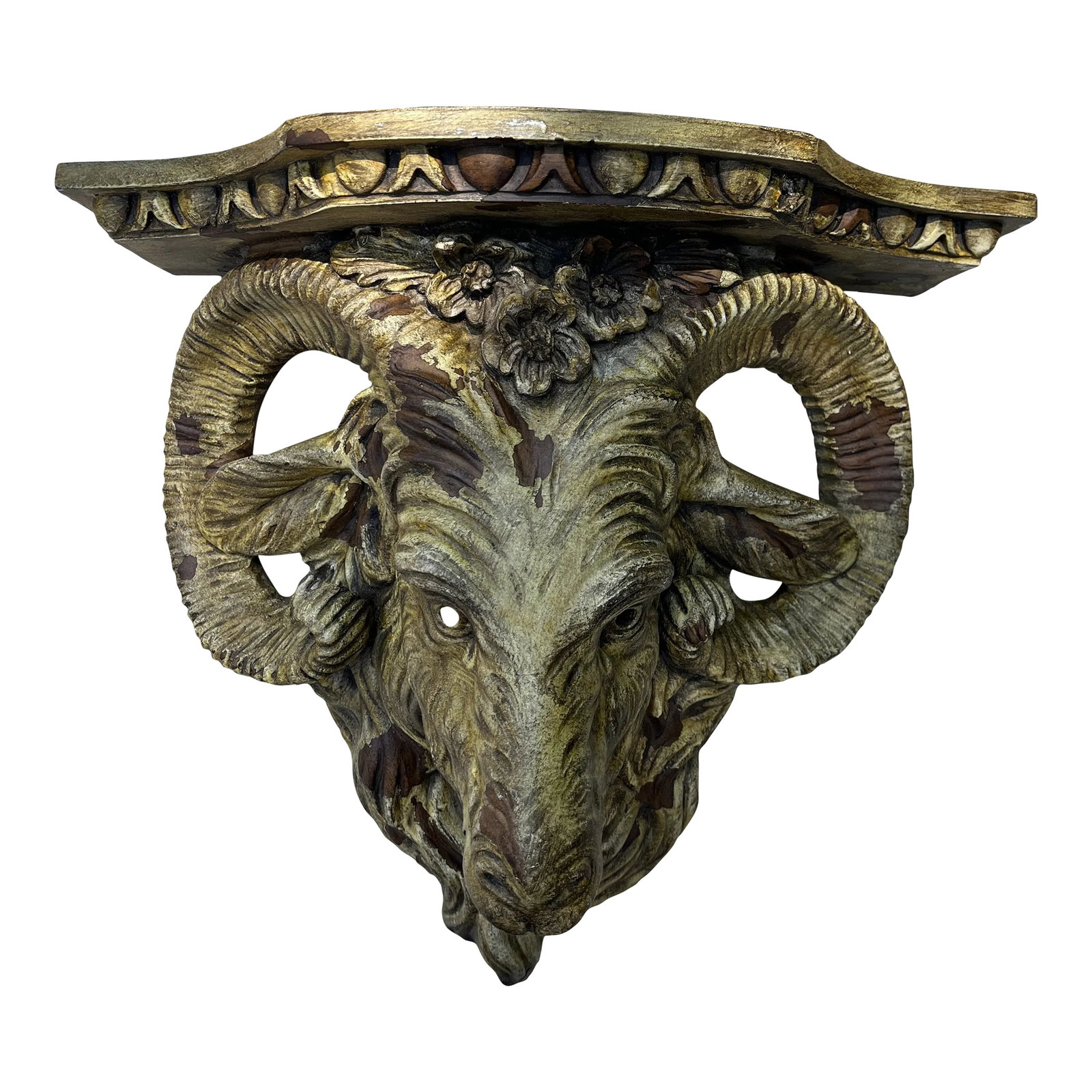 Late 20th Century Ornate Ram's Head Wall Shelf: Ornate and intricate, this solid ram's head wall shelf is made from a cast resin / composite material. Condition: Alterations: Original Condition Unaltered Imperfections: Some Imperfections Condition