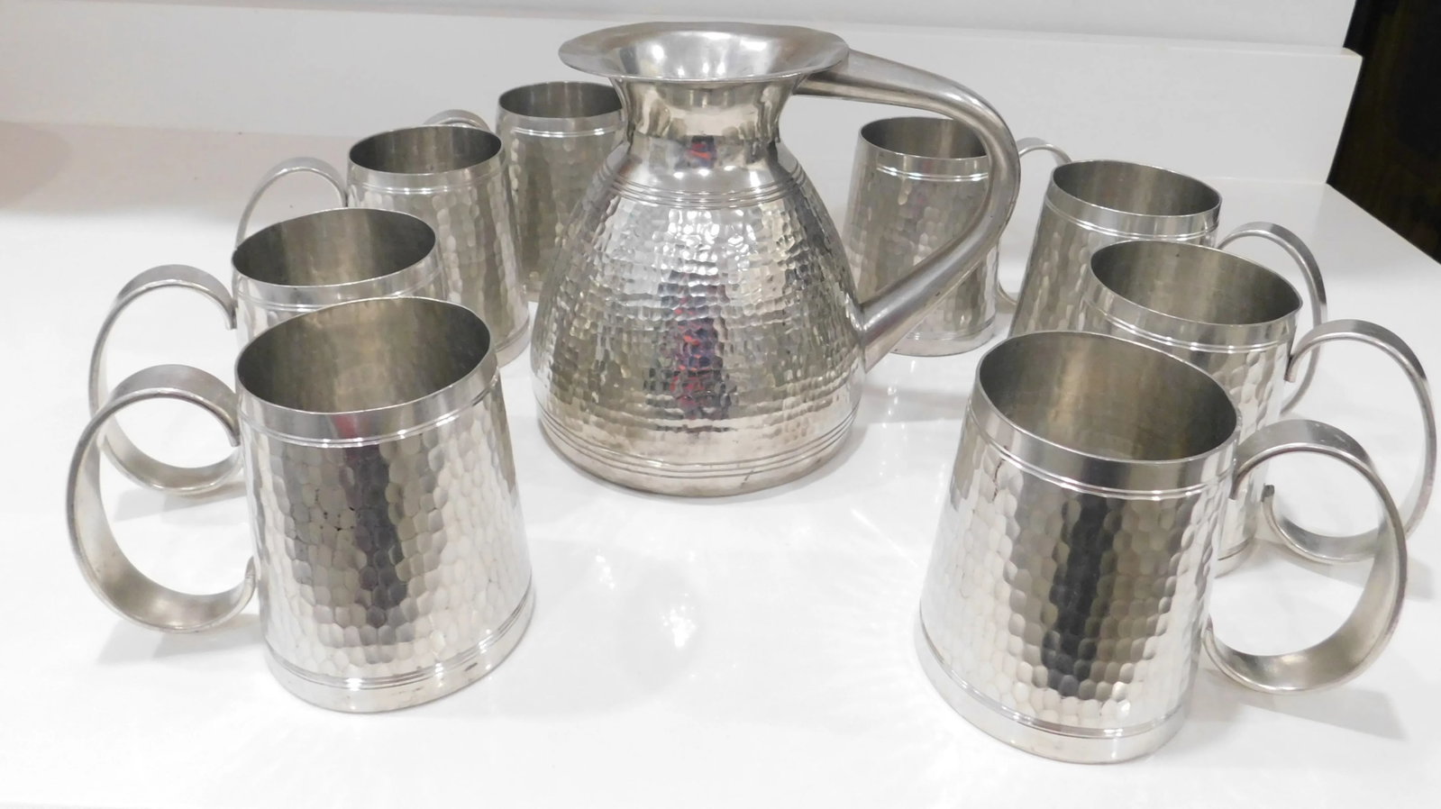 Pewter t.k.f. Banka Tinwerk Indonesian Hammered Art Deco Pewter Pitcher and Eight Tankard Set - 2