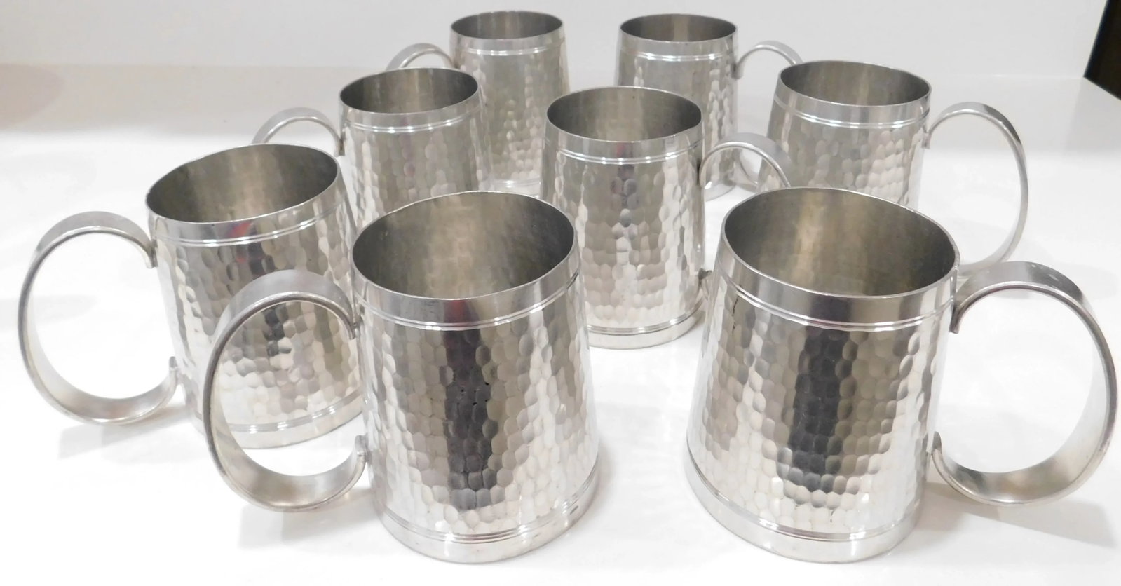 Pewter t.k.f. Banka Tinwerk Indonesian Hammered Art Deco Pewter Pitcher and Eight Tankard Set - 4