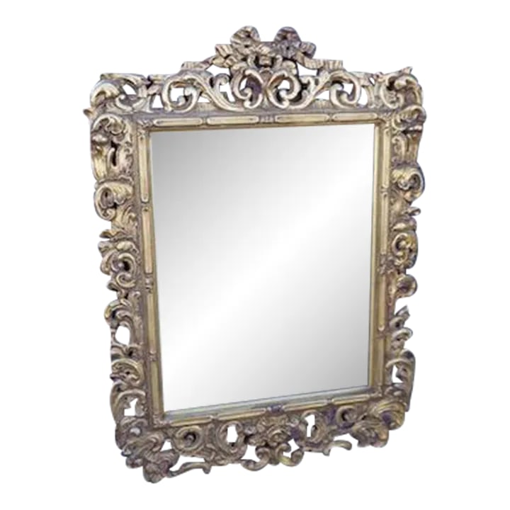 Spanish Revival Gilt Mirror, Circa 1920s: Beautifully hand-carved and gilded. Measures 35 1/2" x 40". This cynosure of the the Spanish Revival style is a star in any room. Condition: Alterations: Original Condition Unaltered Imperfections: So