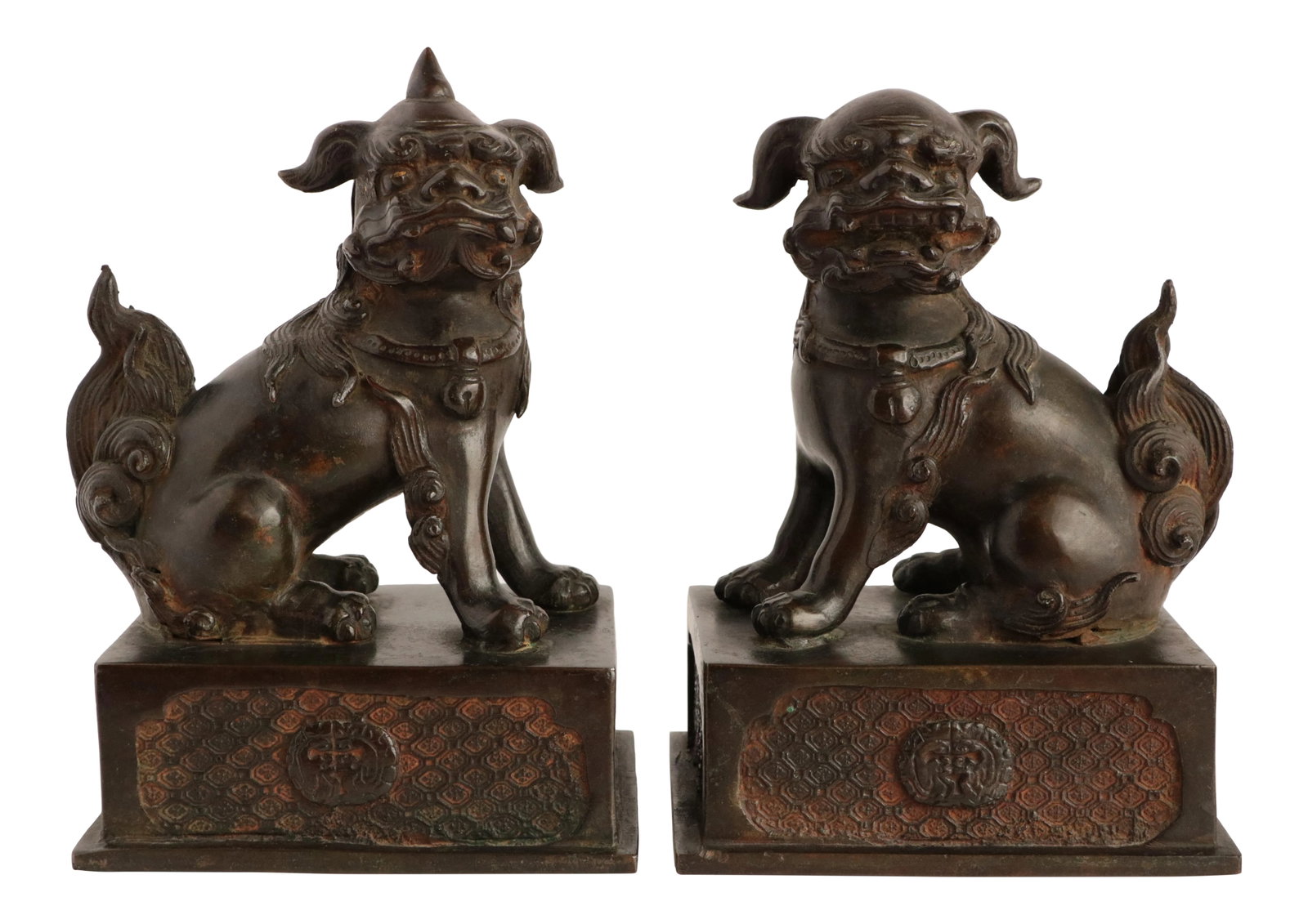 Late 19th Century Meiji Bronze Sitting Guardian Foo Lions: Bronze with dark patina; these Japanese Komainu and Shishi fu dogs sit on rectangular bases with fretwork designs. They symbolize the beginning and the end, with their open and closed mouths.