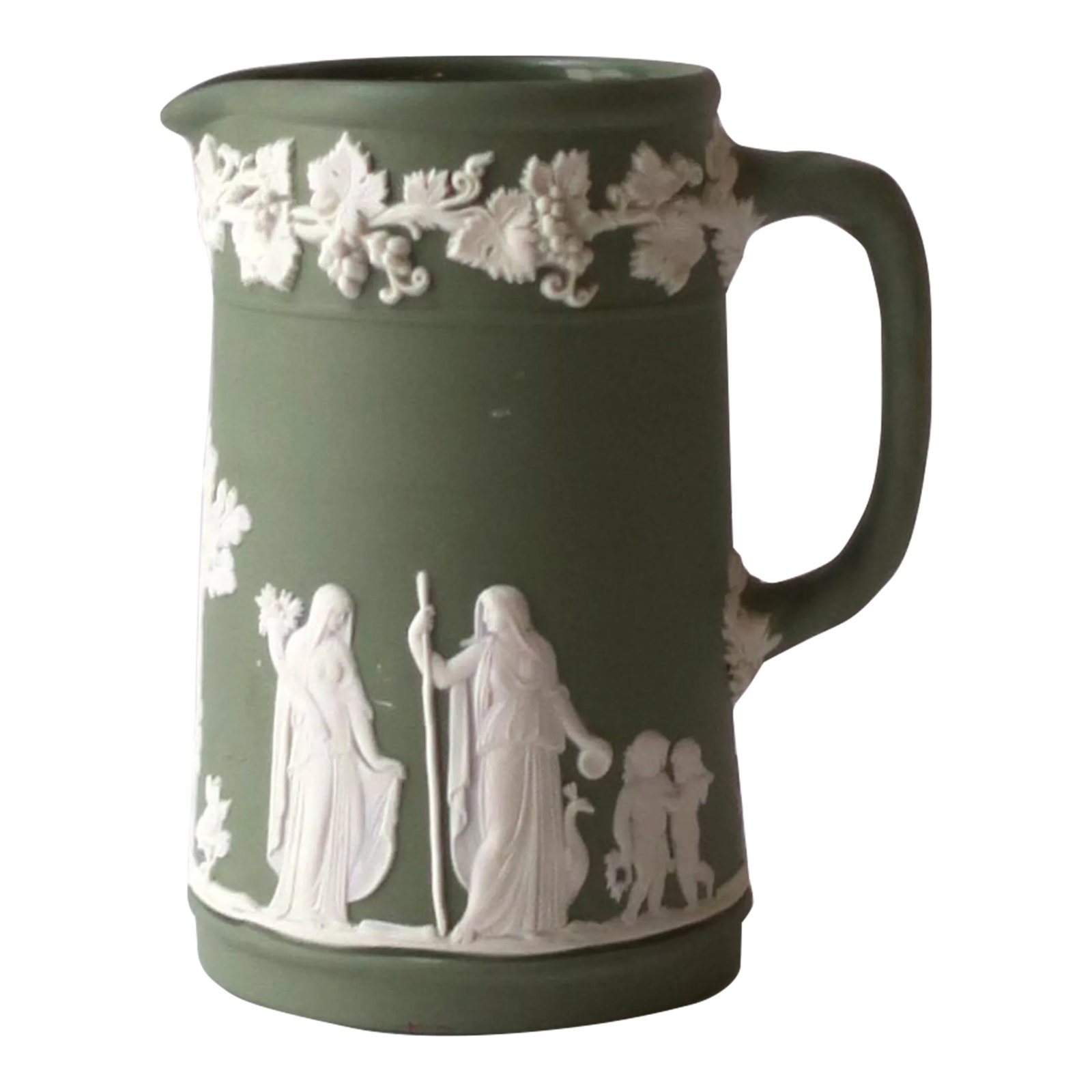 Wedgwood Jasperware Pitcher in the Neoclassical Style: An English green and white Jasperware matte stoneware pitcher by Wedgwood in the Neoclassical style, circa early-20thth century, England. Pitcher has a white raised relief of grapes, leaves and