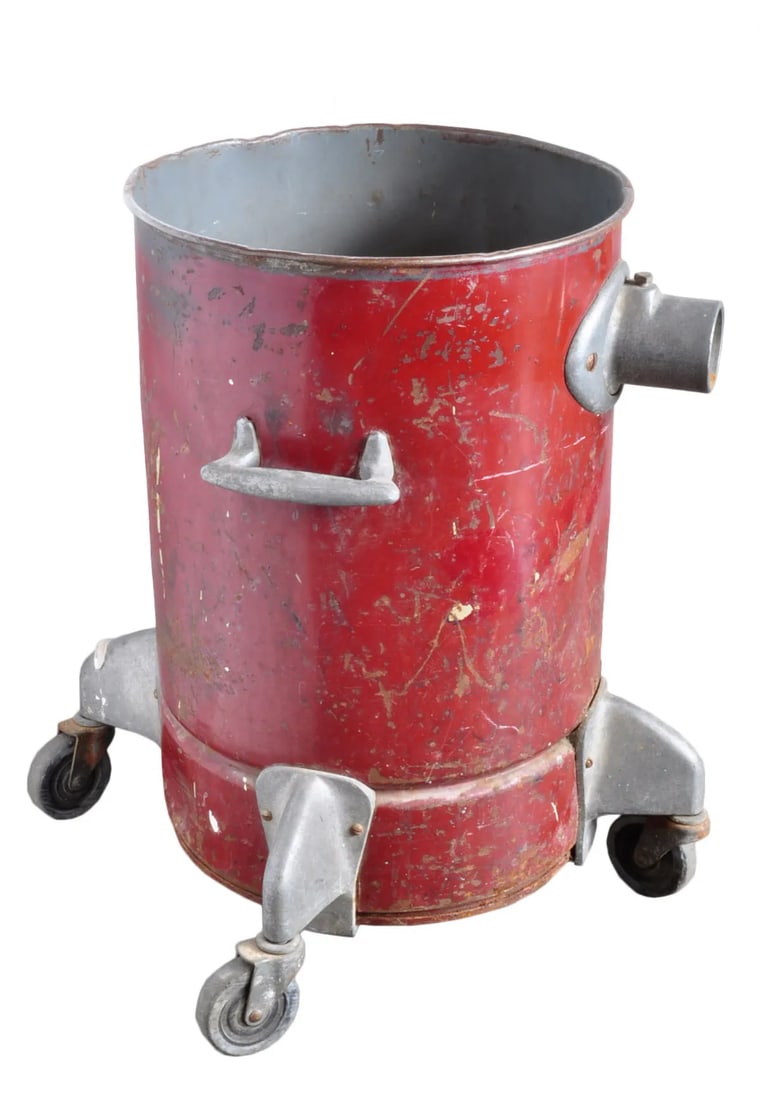 Vintage Red Steel Can on Casters: A vintage red steel can on casters. May have been connected to a tube that once transferred something. Great to use for storing items, plants, or just as a vintage decoration! Condition: Alterations: