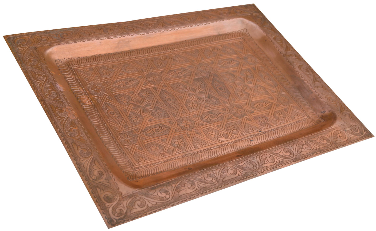 Late 20th Century Handmade Moorish-Patterned Copper Tray: Hand-hammered Moroccan copper tray with an ornately engraved motifs and intricate Arabesque designs. This gorgeous accent ships within 1-2 business days from purchase, and to be received within 2-4