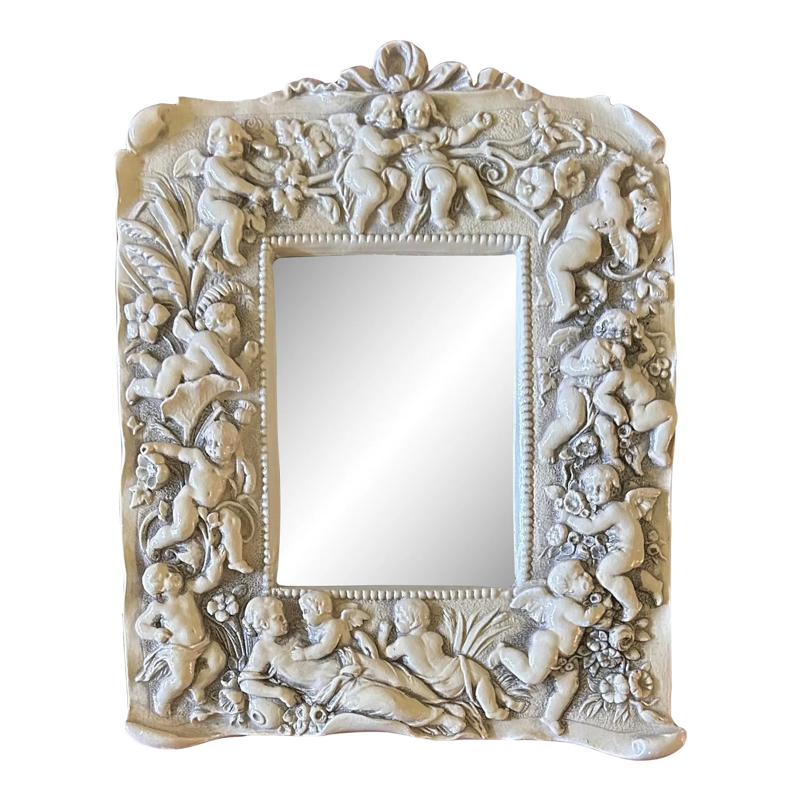 Vintage Small Mirror With Cherubs & Flowers Frame: Vintage small wall mirror with plaster frame featuring cherubs and flowers. From Gargoyles studio, Brooklyn NY. Condition: Alterations: Original Condition Unaltered Imperfections: Some Imperfections