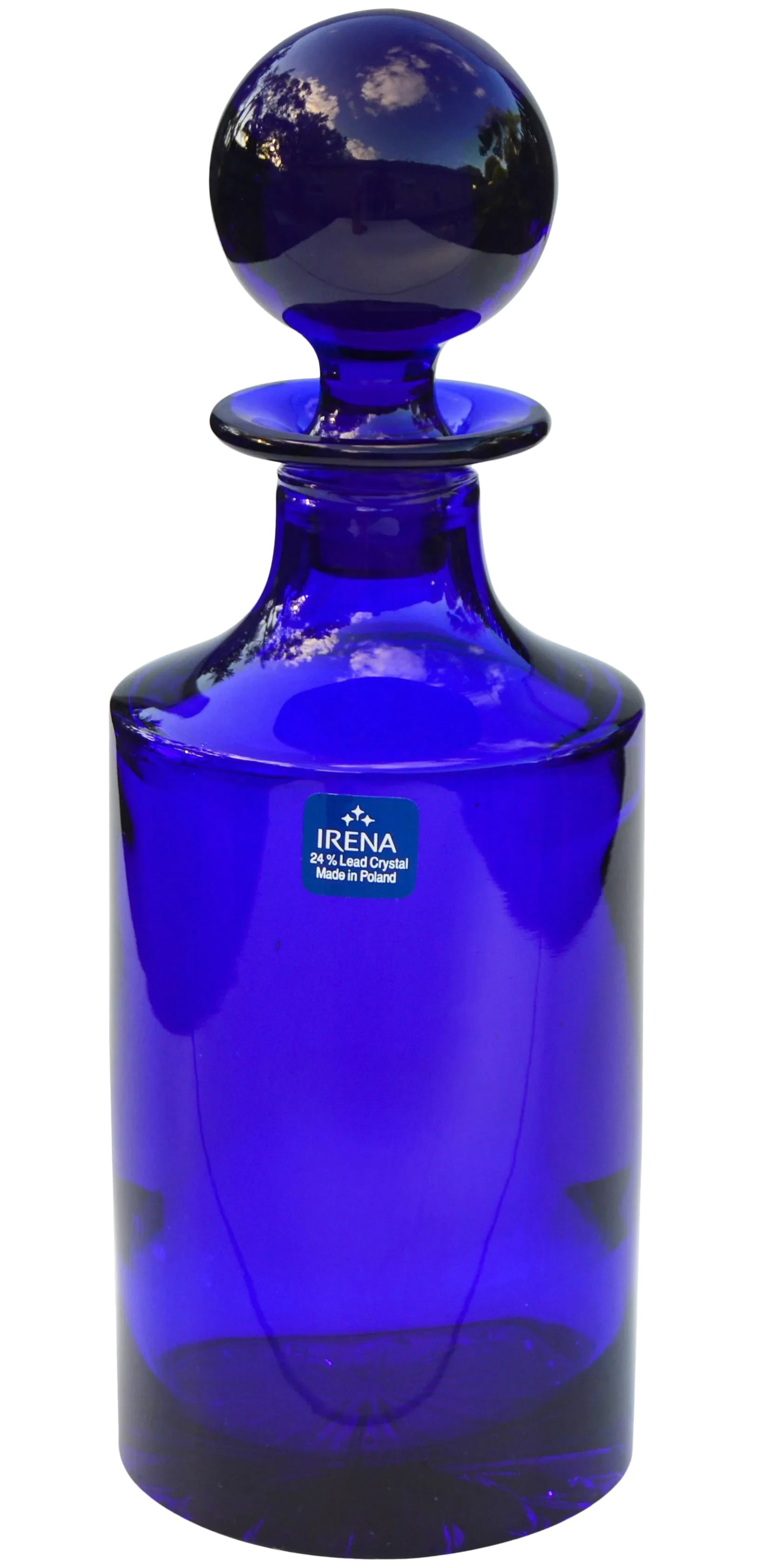 Mid-Century Blue Crystal Decanter: Midcentury cobalt blue heavy crystal decanter with ornate stopper and fine details. Marked: Irena Poland. Condition: Alterations: Original Condition Unaltered Imperfections: Some Imperfections