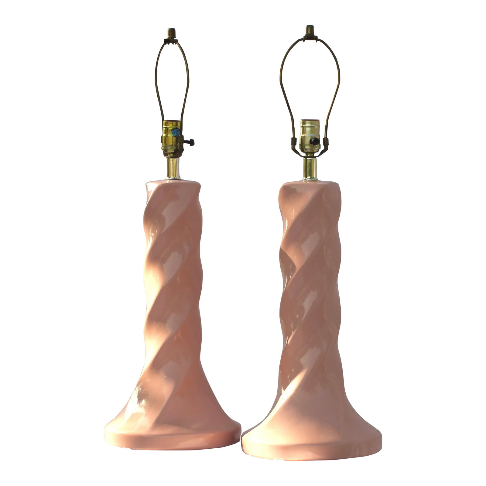 Pair of Large Spiral Lamps in Peachy Pink From the 1980s: Pair of oversized spiral lamps in pink ceramic. Very Michael Taylor style. Column style with a flared base. 22" to socket 28" to finial 9" wide base Condition: Alterations: Original Condition Unaltere