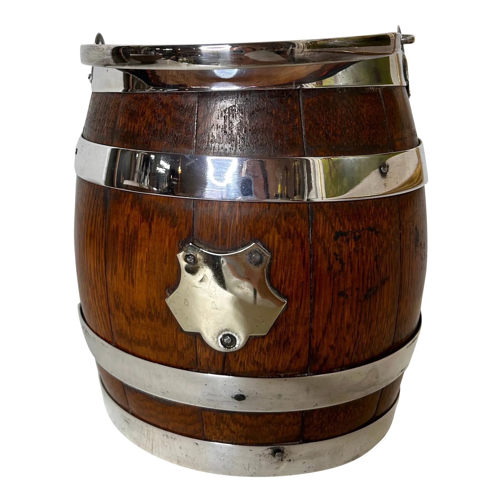 Antique English Oak and Silver Plate Biscuit Jar: Late 1900's English biscuit barrel with original ironstone liner, silver plated handle, strapping and upper rim. Condition: Alterations: Original Condition Unaltered Imperfections: Some Imperfections 