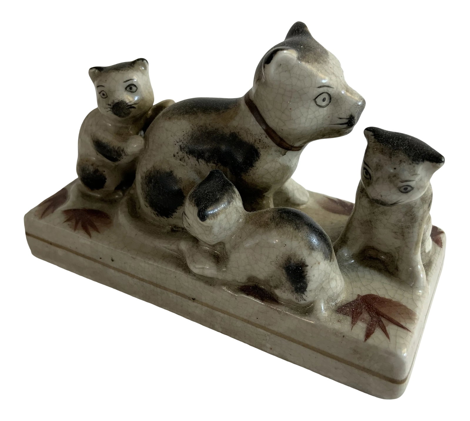 1970s Vintage Chinese Cat Family: Vintage glazed ceramic family of mother cat with three kittens. Charming playful representation with decorative leaves painted on surface. Probably Chinese in origin. Faint crackle in glaze adds to