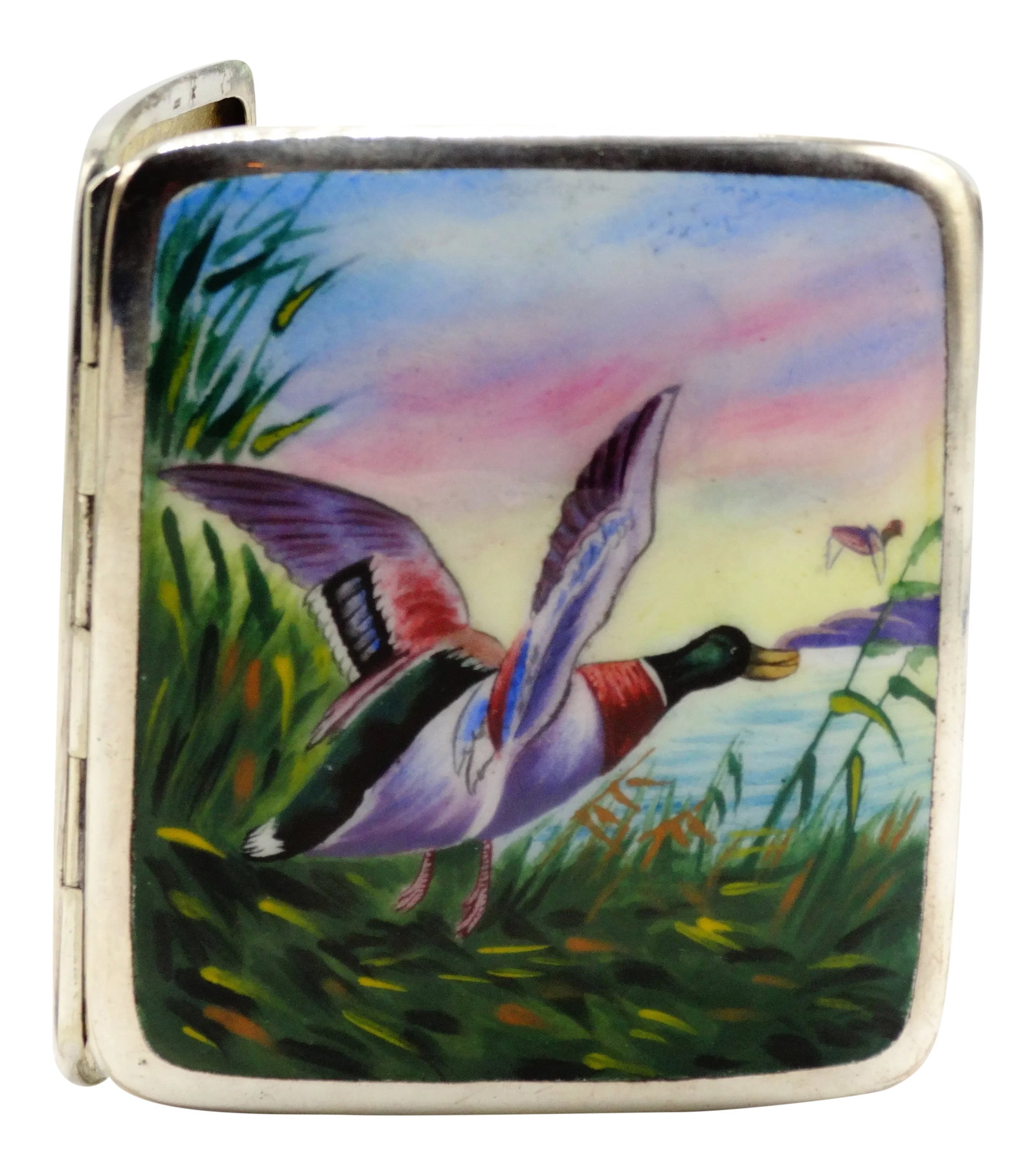 Vintage Sterling Silver Enamel Case Mallard Duck: A fine quality Vintage sterling silver and enamel cigarette case with a mallard duck in a landscape. It has a gilt washed interior and retains the original elastic bands that hold cigarettes in