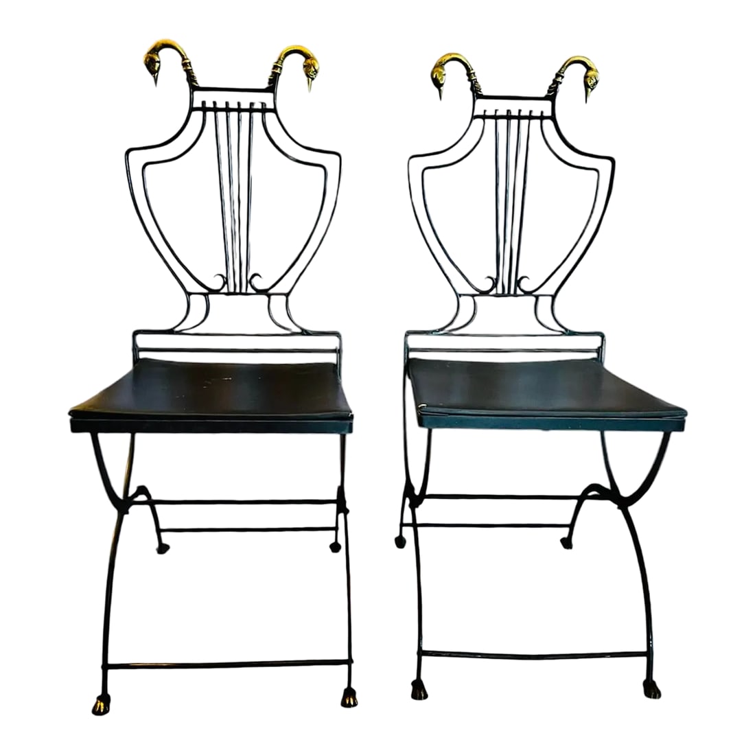 1920s Maison Style Black Iron Lyre Back Swan Chairs-Set of 2: Maison Jensen style cast iron chairs. These vintage folding chairs manufactured in a neoclassical design with black Lyre backs and brass swan heads. The legs feature brass claw feet. These chairs
