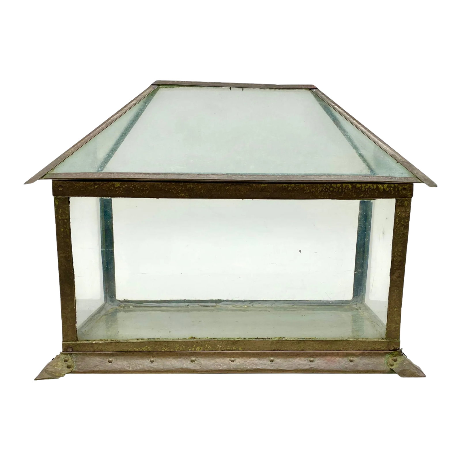 Antique Arts & Crafts Copper and Glass Terrarium: This is an antique terrarium made of glass and copper. It is from the late 19th early 20th century in the Arts & Crafts style. The roof of the terrarium lifts off to allow access. A base with four