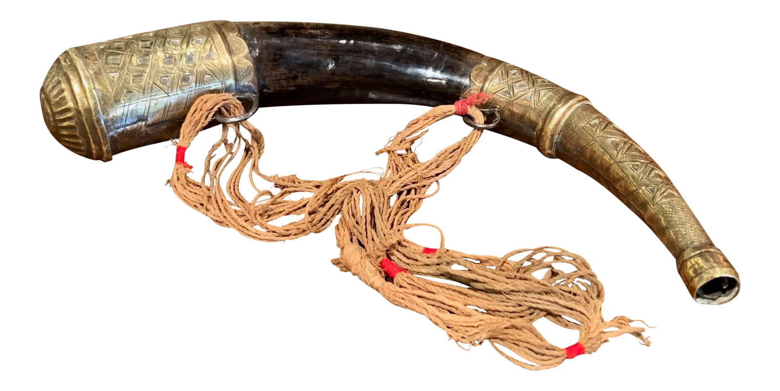 19th Century French Mounted Drinking Horn With Engraved Brass and Tassels: Add a touch of historic character to a study or cabinet with this striking French drinking horn, crafted circa 1850. Formed from a natural cow horn, the curved body is mounted with engraved brass