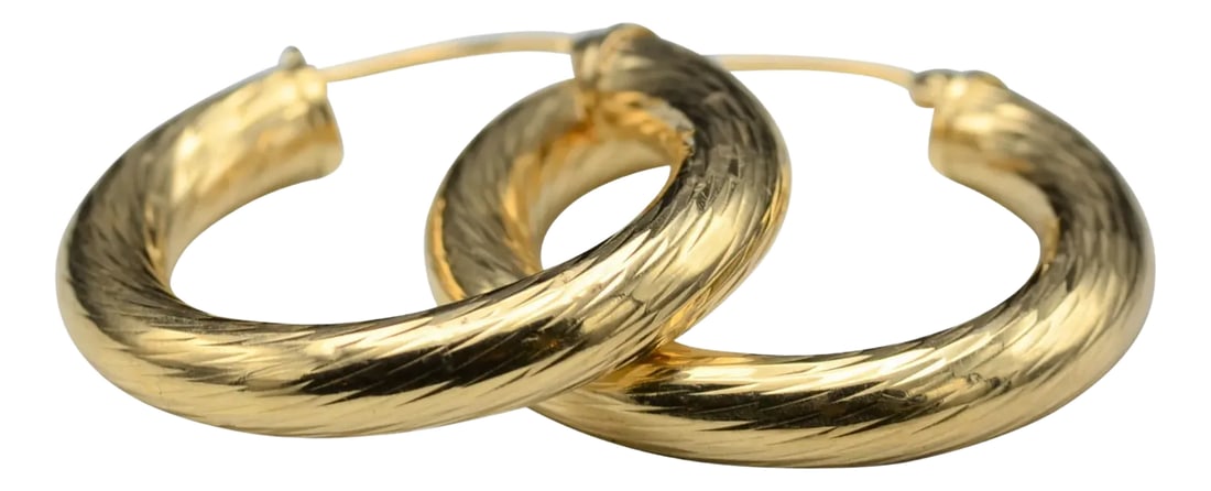 The Benicias: Classic Ladies 14 Karat Yellow Gold Hoops, 2 Pieces: The Benicias Classic Ladies 14 Karat Yellow Gold Hoops. These classic style hoop earrings feature a beautiful diamond cut French swirl pattern that shimmer when the light hits them. The earrings have