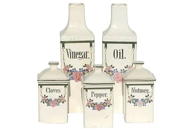 European Faience Cruets & Spice Jars - S/ 5: Five-piece European faience canister set created for the English speaking market. Set consists of oil and vinegar cruets as well as nutmeg, pepper, and clove spice jars with lids. Underglaze mark on u