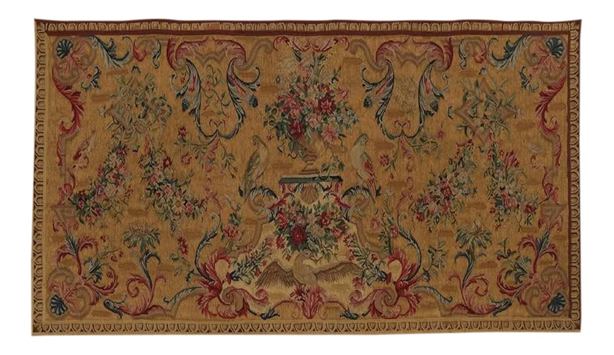 Birds & Floral Wall Square Tapestry: Hand-woven wool horizontal tapestry featuring a flora motif with birds in shades of ochre, green and red. Hand-woven with a wool pile on a durable cotton foundation by the artisans of China. Measures: