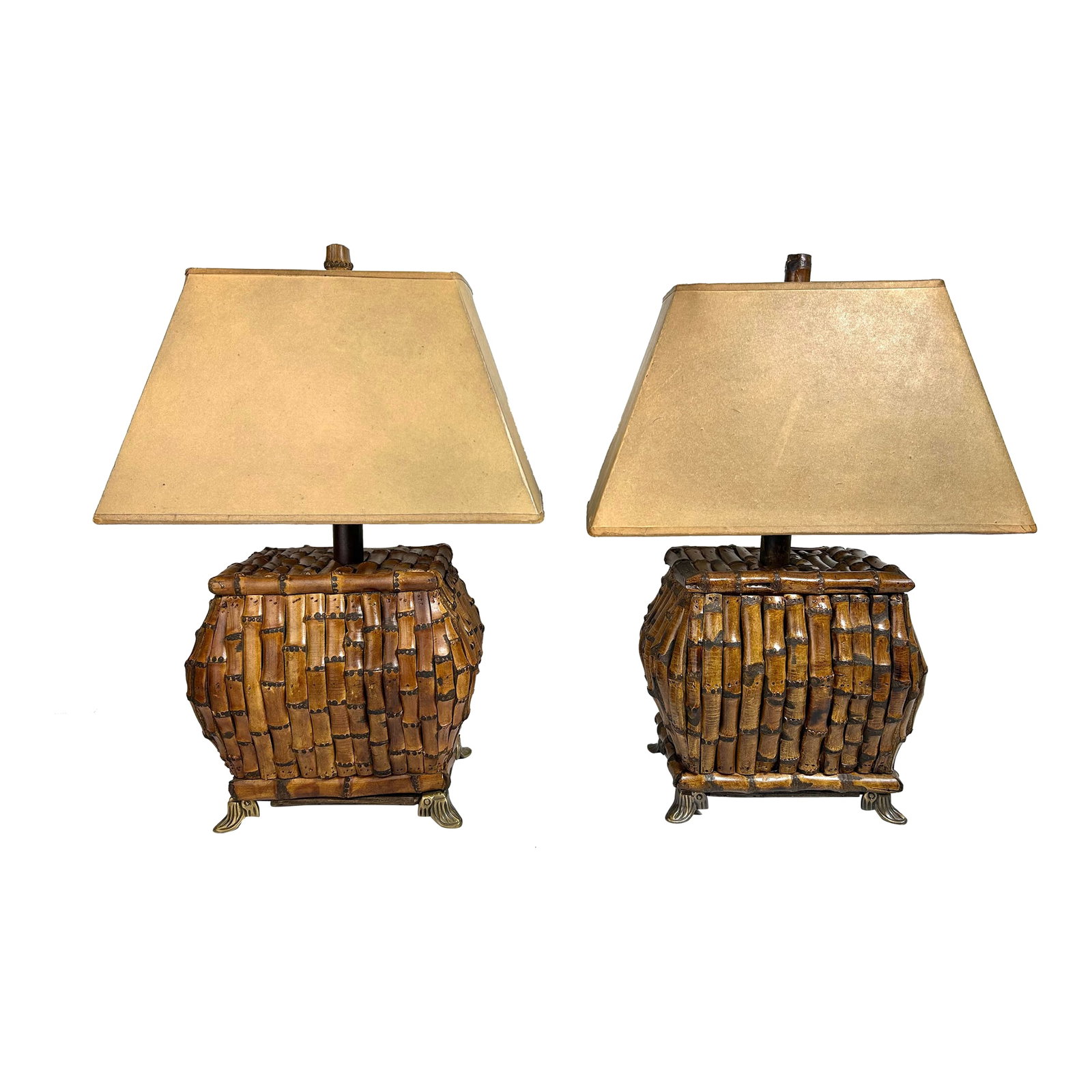 1980s Chinoiserie Asian Safari Style Rectangle Bamboo Table Lamps - a Pair: Pair of vintage safari style bamboo table lamps with rectangular paper shades and brass toned feet. Measures 18" H x 6.25" x 9" Condition: Alterations: Original Design Modified Imperfections: Some