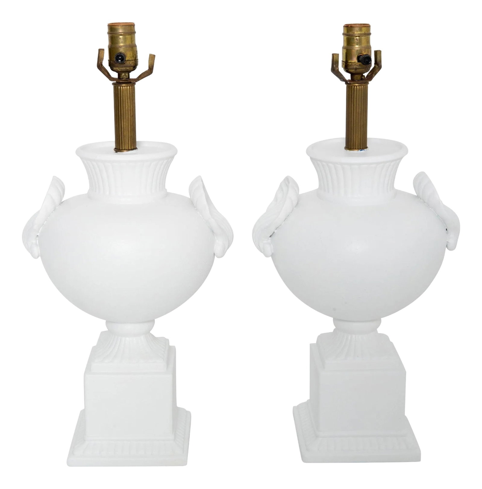 Pair Dorothy Draper style Bulbous Urn Lamps with Shell Detail: Pair of white painted plaster table lamps in the style of Dorothy Draper. Dramatically bulbous shape with large shell features on each lamp. Harps and shades are not included. Condition: Alterations: 