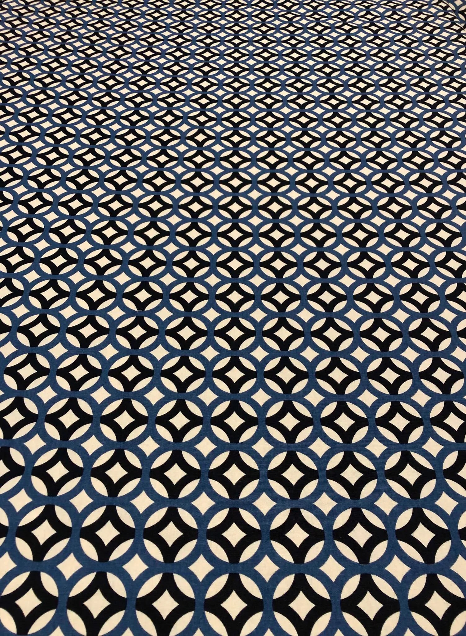 Richloom Lyndon - Mid-Century Modern Style Navy Circular Blue and White Multipurpose Fabric - 58.5 Y: This printed cotton fabric from Richloom has a modern overlapped circular pattern in a classic navy and royal blue color combination. The basecloth is 100% cotton canvas, making it a great choice for
