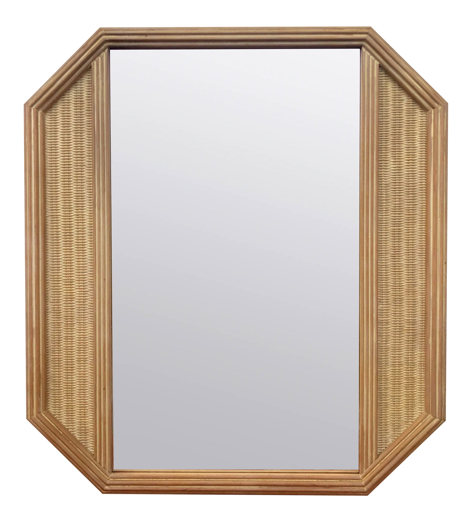 Large Geometric Octagonal Natural Woven Wicker Mirror: Rare and unique, this vintage find comes ready to hang! It is eight-sided geometric bliss with hand woven wicker panels on each side. The outer frame is a carved wood and it has a sheer glazed finish 
