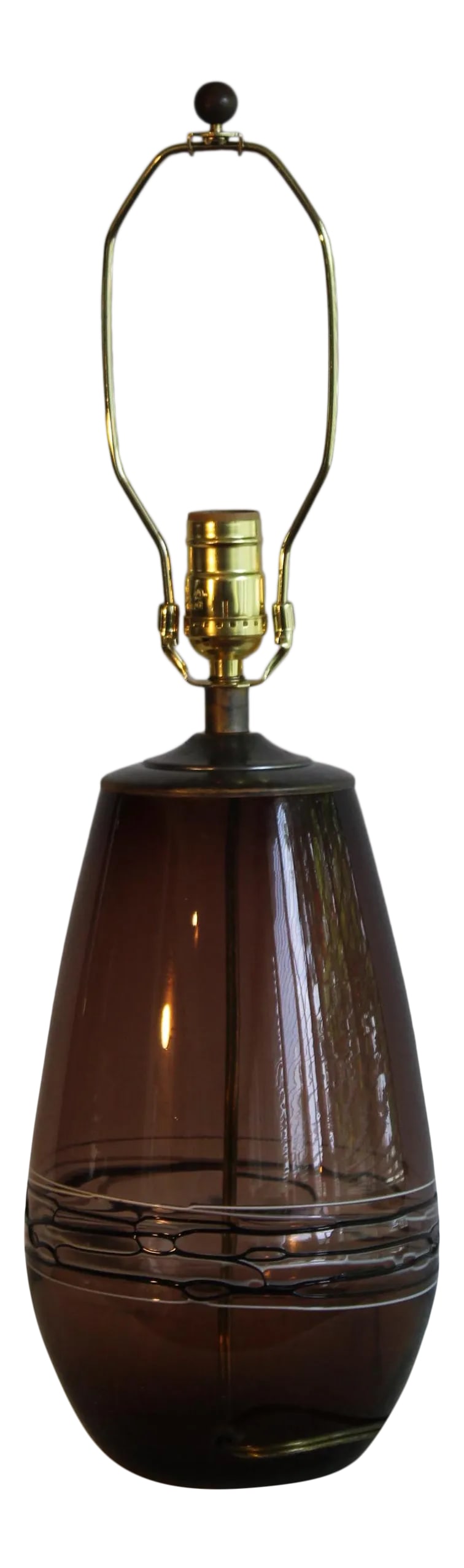 Translucent Bronze Hue Murano: Beautiful and simple hand blown Murano table lamp with Onyx and ivory overlay. Unusual transparent bronze hues. Graceful shape. Looks great illuminated or natural light. 13 inches tall. 7 inches in
