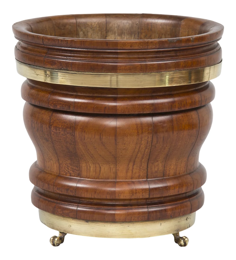 Georgian Walnut Jardiniere, Circa 1820: Turned walnut coopered jardiniere with brass bands and three brass paw feet. Beautiful graining in the walnut. Condition: Alterations: Unknown Imperfections: Some Imperfections Condition Notes: Some