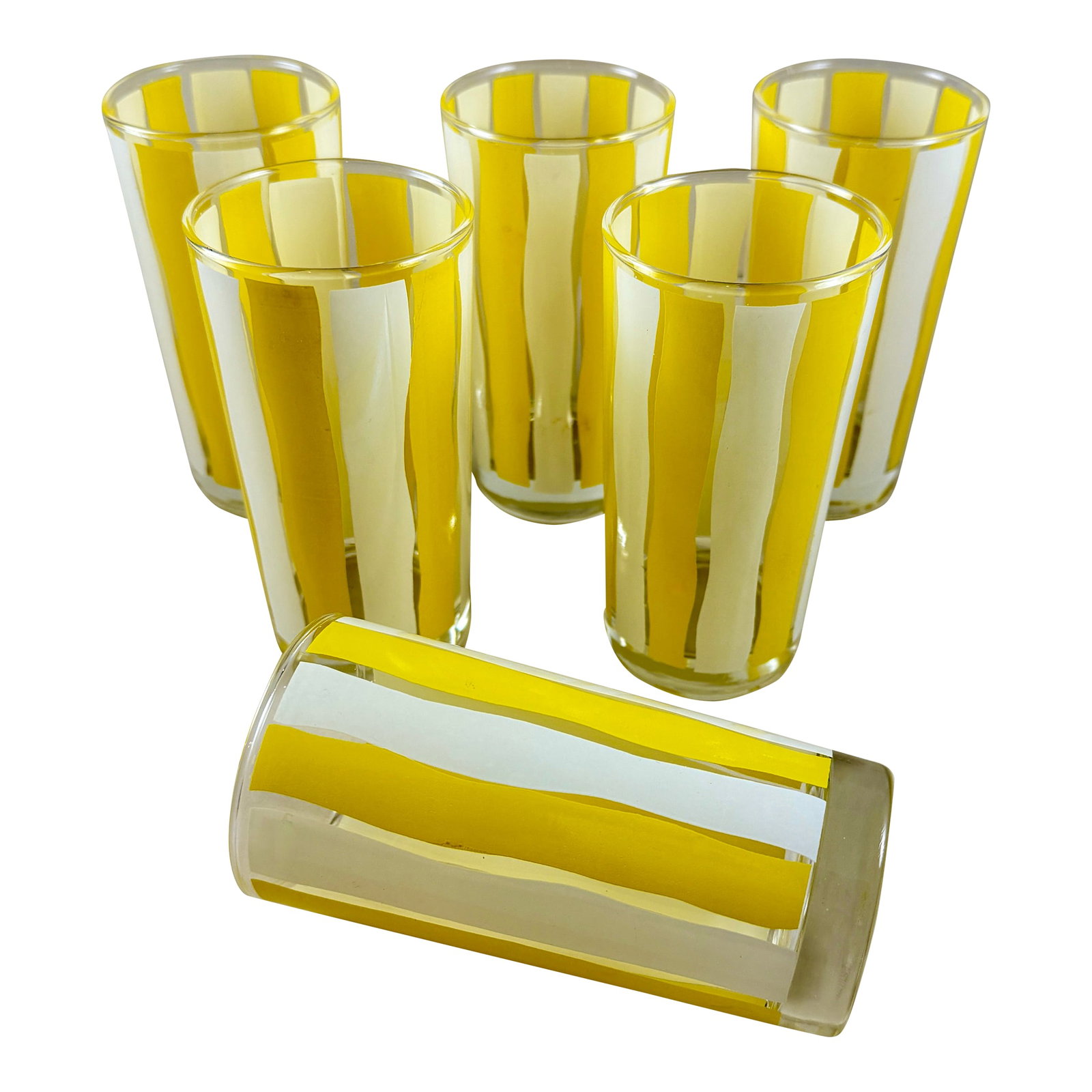 Mid-Century Modern Yellow & White Striped Highball Glasses, Set of Six: From the Mid-Century Modern era, a set of six highball glasses, circa 1960s. Enameled on clear glass in a brush-stroked, vertical striped design of bright sunshine yellow and clean white, these