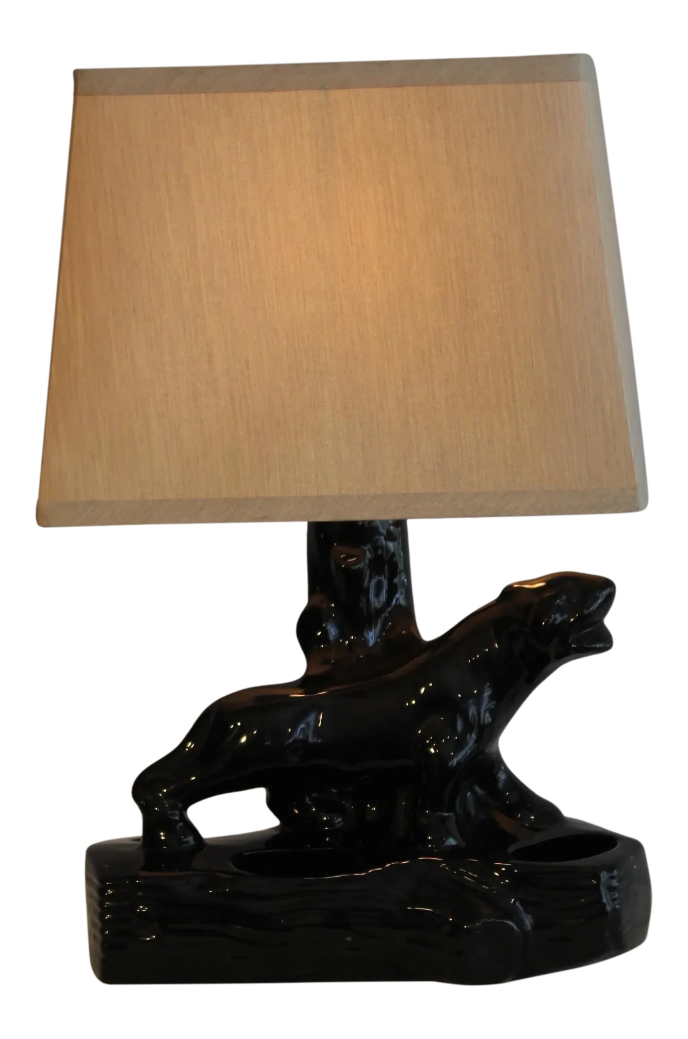 1950s California Ceramic Panther Table Lamp: A beautiful example of California ceramic.planter lamp.Characterized by early french Art Deco. Sleek and low slung panther. A preferred animal of 1950's design. 10 inches tall 11 inches wide. approxim