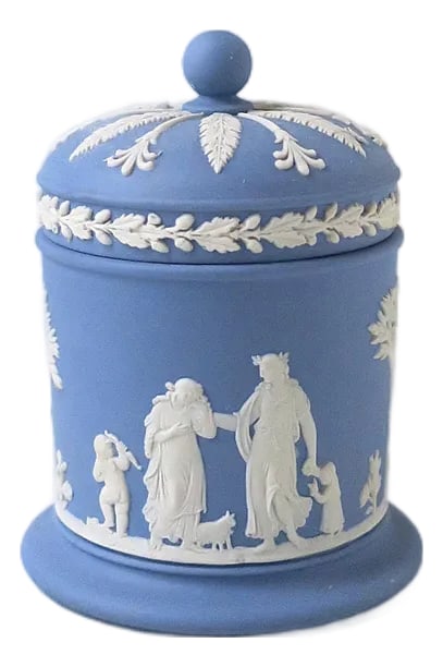 Neoclassical Wedgwood Jasperware Box: A beautiful English blue and white Jasperware box, in the Neoclassical Style, by Wedgwood, England, 1968. Box is blue and white stoneware with a 'rotunda' style dome lid decorated with a white raised