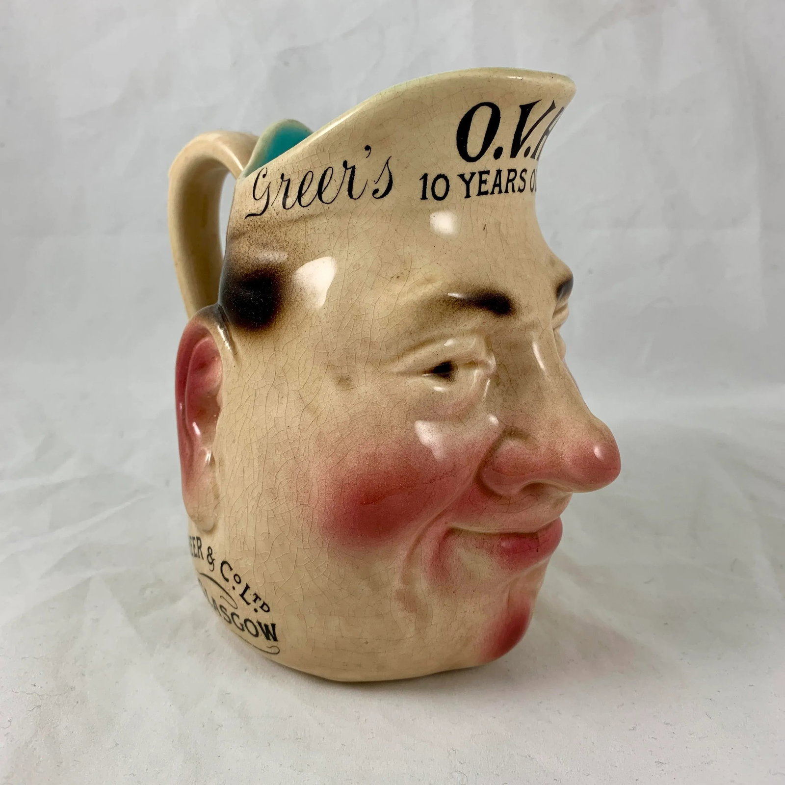 French Sarreguemines Advertising Face Jug for Greer's Scotch Whiskey, 1890s - 2