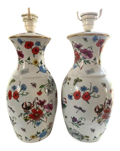 Gucci Limoges Bernardaud Lamps - a Pair: Incredible pair of porcelain lamps by Bernardaud Limoges in France. Made for Gucci, decorated with Vittorio Accornero's signature "Flora" print with butterflies and flowers. In excellent vintage condi
