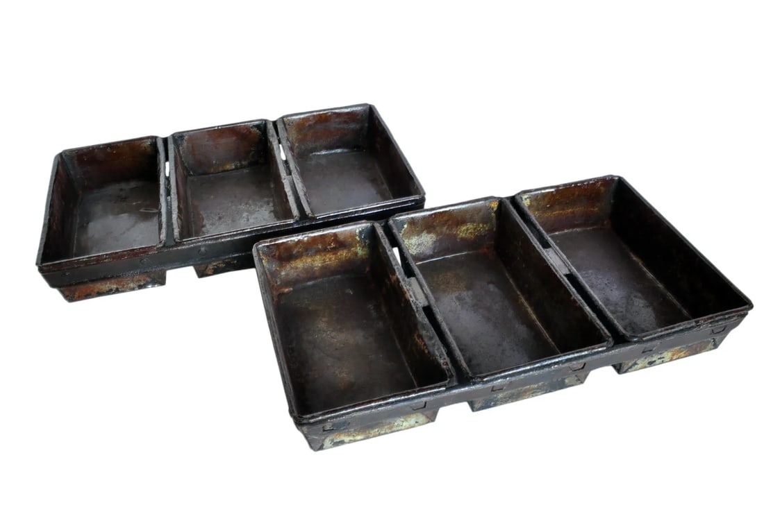 Vintage Bread Pans - Pair: A charming vintage pan set with a rich history, potentially employed in the art of baking, or now ready to be repurposed as a delightful planter. Intended exclusively for decorative purposes, this