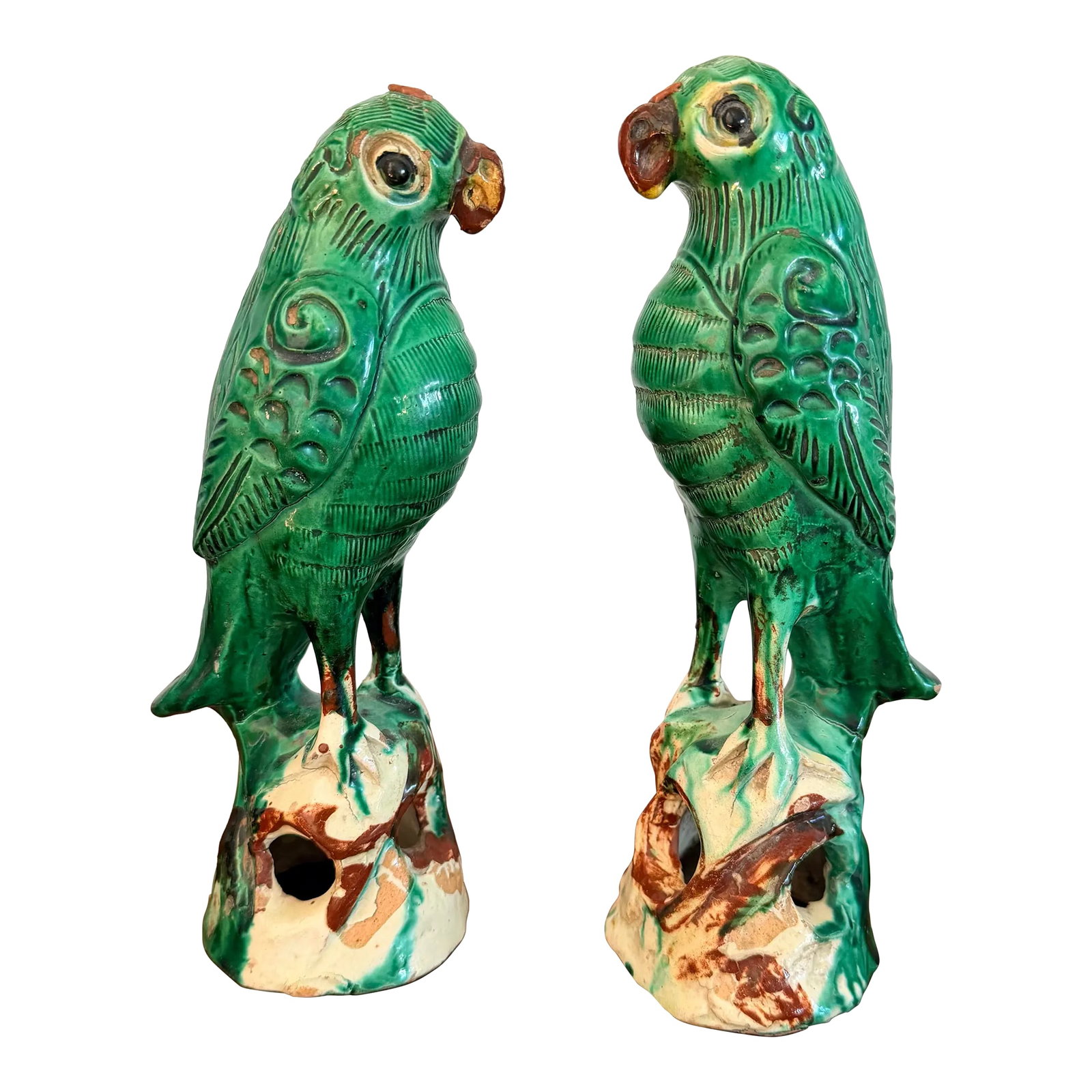 Pair Antique Chinese Green Parrots: Pair of iconic Chinese export ceramic parrots wonderfully glazed from the early 1900s. Highly collectible and decorative, similar in nature to Chinese foo dogs but much more unusual. In fine antique c