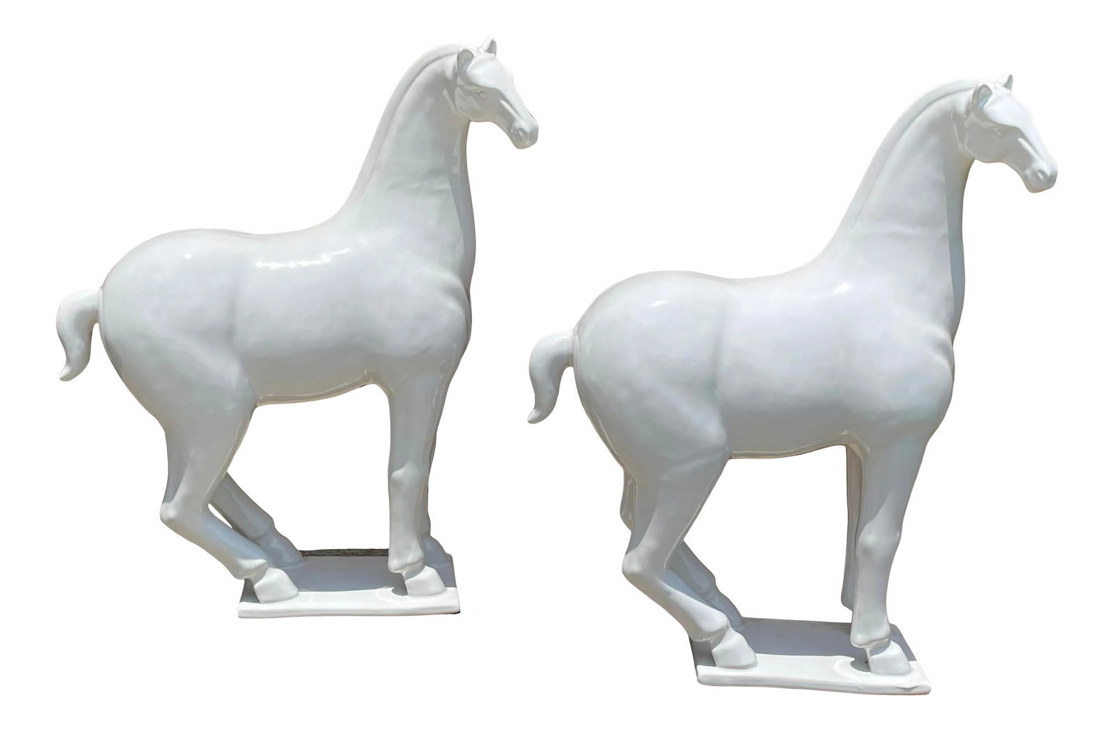Ceramic Tang Horses - a Pair: These wonderful ceramic horses in white glaze are reproductions of horses produced during China's Tang Dynasty. Along with figurines of camels and other animals, and of servants and civil officials, p