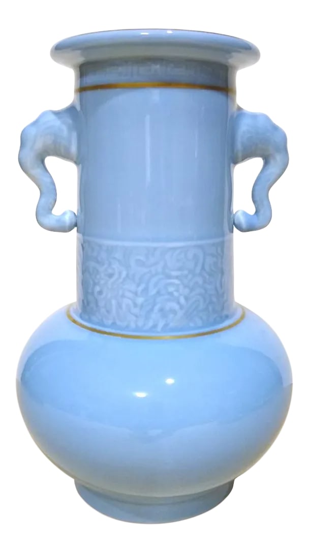 Early 20th Century Chinese Porcelain Elephant Head Handles Vase: Chinese porcelain elephant head handles vase, with a gilt lip and a sky blue glaze on the body and interior, a lighter blue glaze on the inset base. A meander border in low relief is carved below the