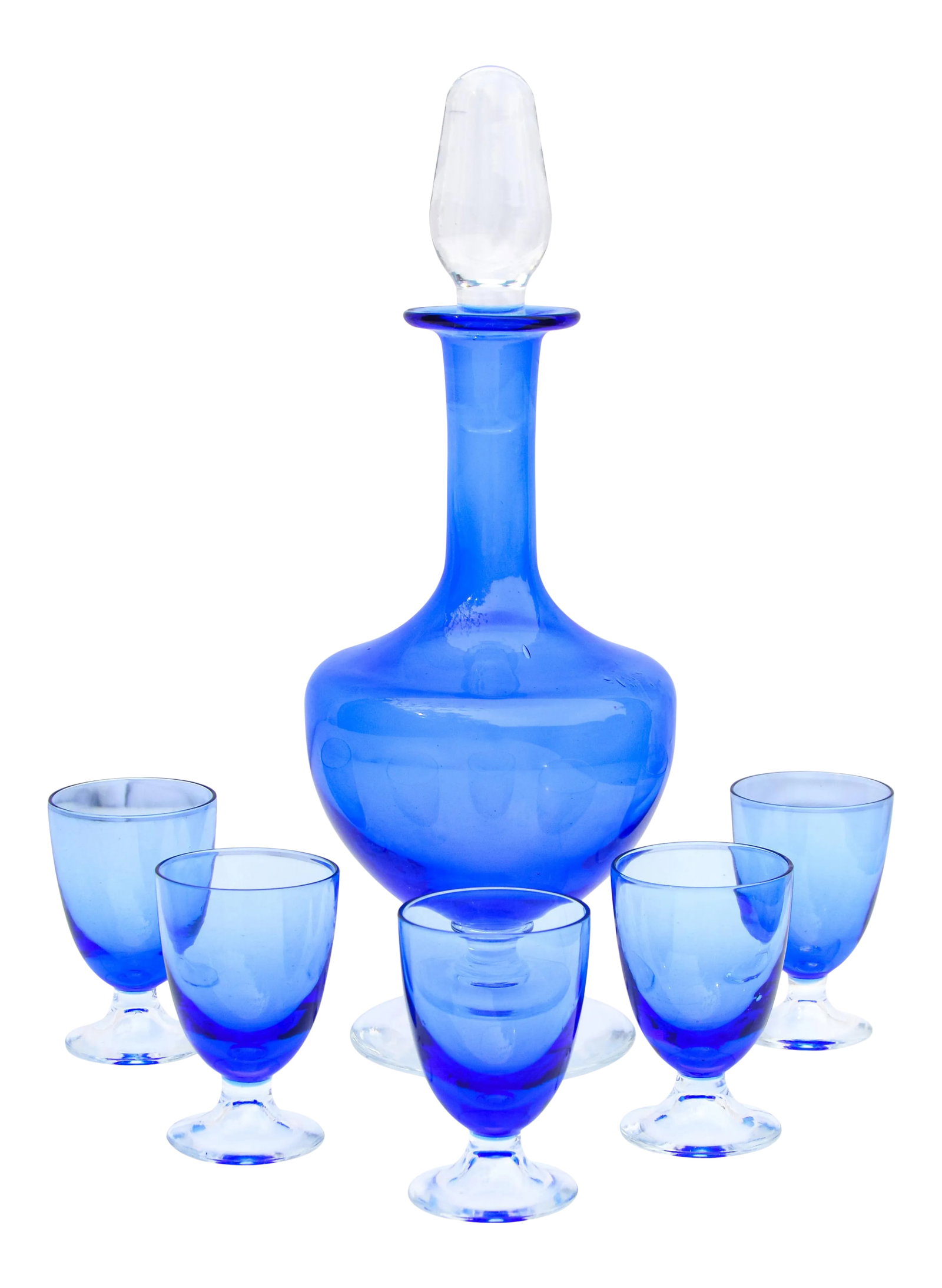 Vintage Blue Decanter & Glasses, S/6: Vintage glass set consisting of five glasses and decanter with stopper. Featuring beautiful blue color and ornate fine details. Decanter: 4''Dia x 10''H; Glasses: 1.75''Dia x 2.75''H. No maker's
